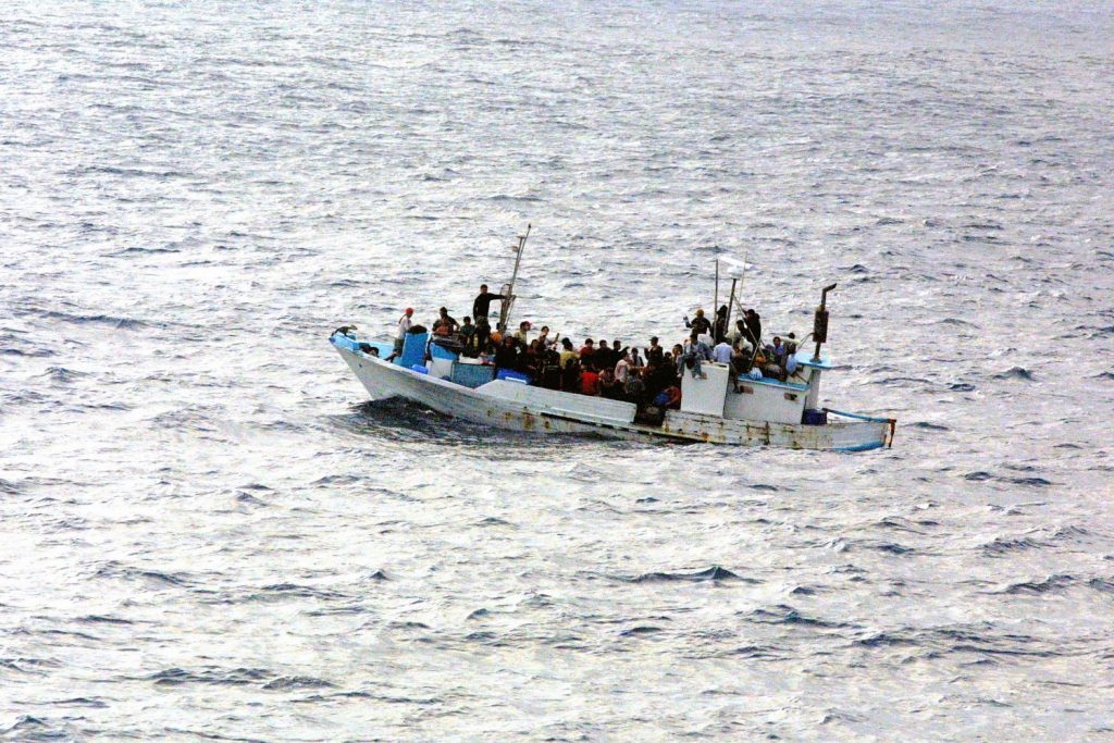 Refugees on a boat Custom