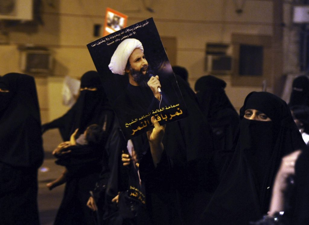 protester holds picture sheikh nimr al nimr during rally coastal town qatif against sheikh