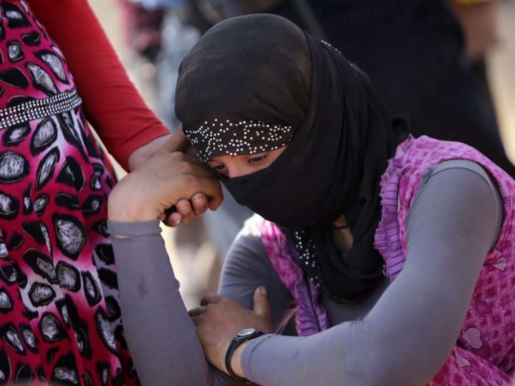 15 Yazidi Woman AFP Custom