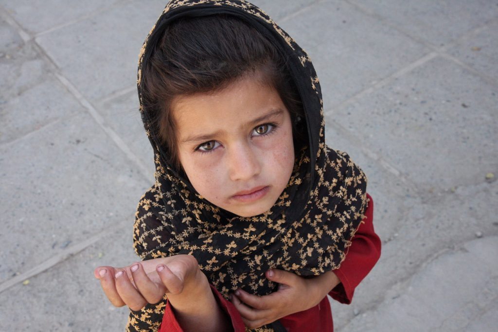 Afghan girl begging